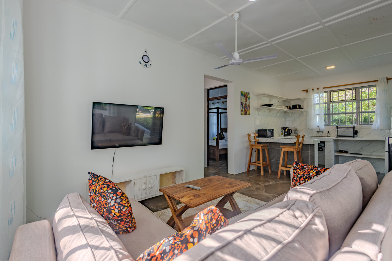 Open-plan living and dining area in the two-bedroom villa
