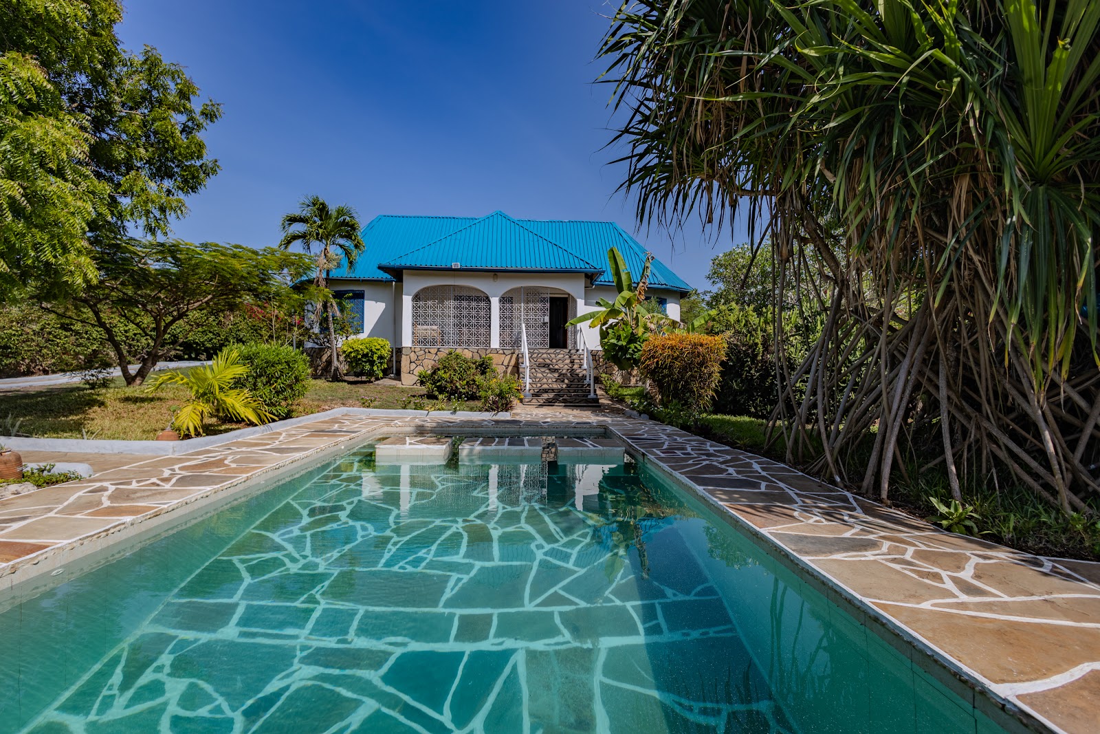 Private pool in the gardens at Auregi Kwitu